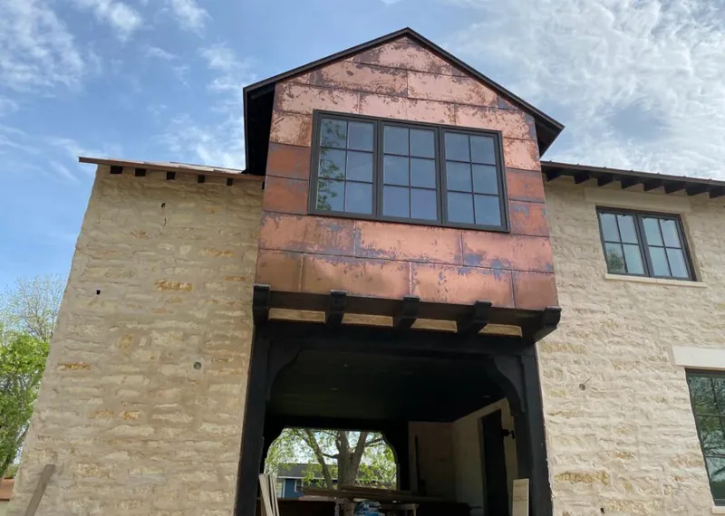 Copper metal panel facade on a stone building for Metal Roof Coating in Hockessin